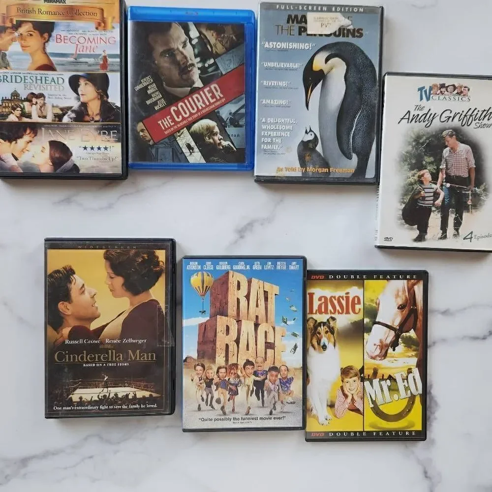 Bundle of seven empty plastic DVD cases rat race Cinderella Man lassie